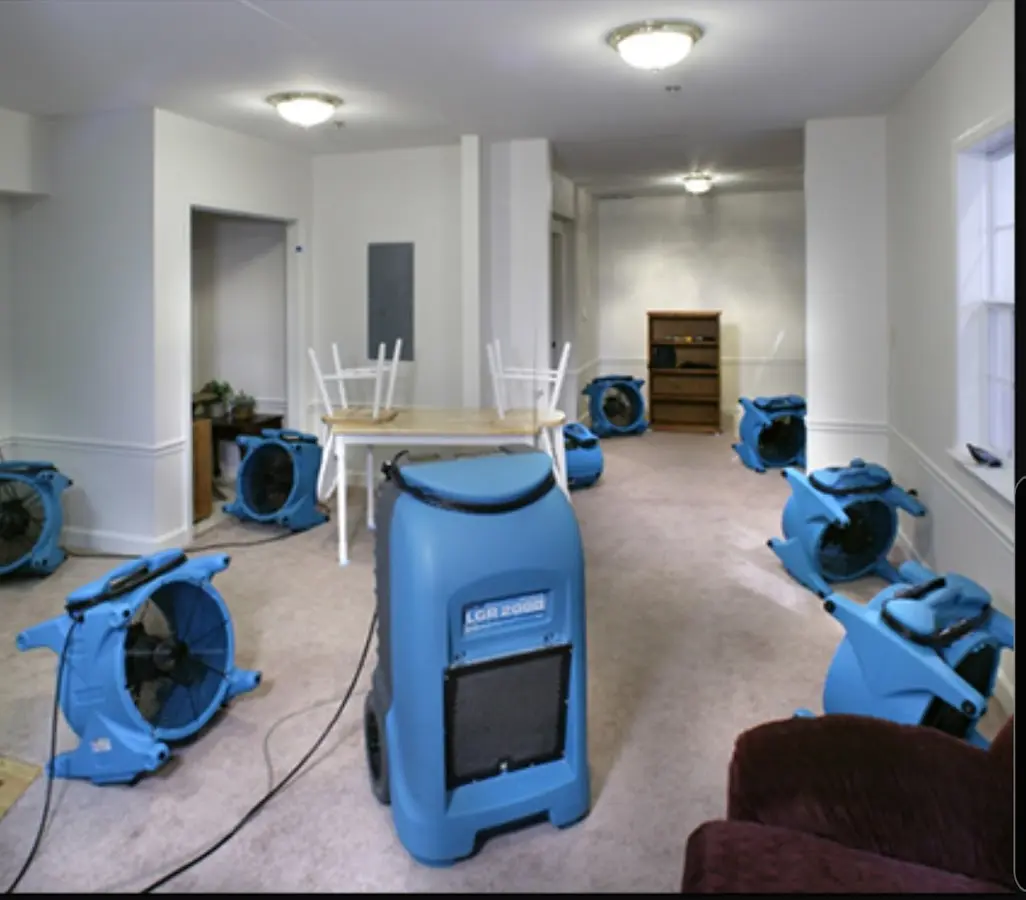 Air movers and dehumidifier setup for Water Damage Restoration in McKinney